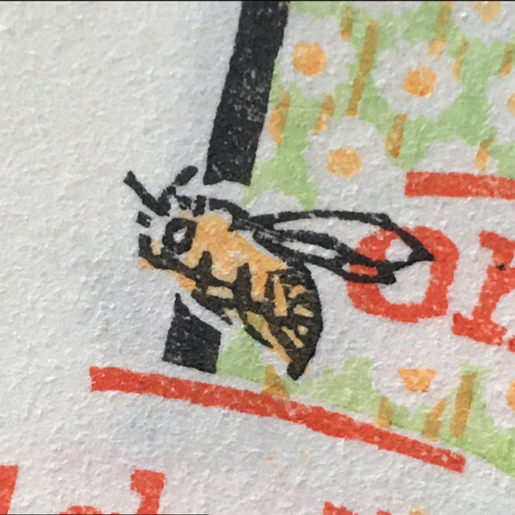 Close-up of printed bee