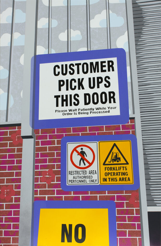 Painting of the back of a warehouse roller door with signage