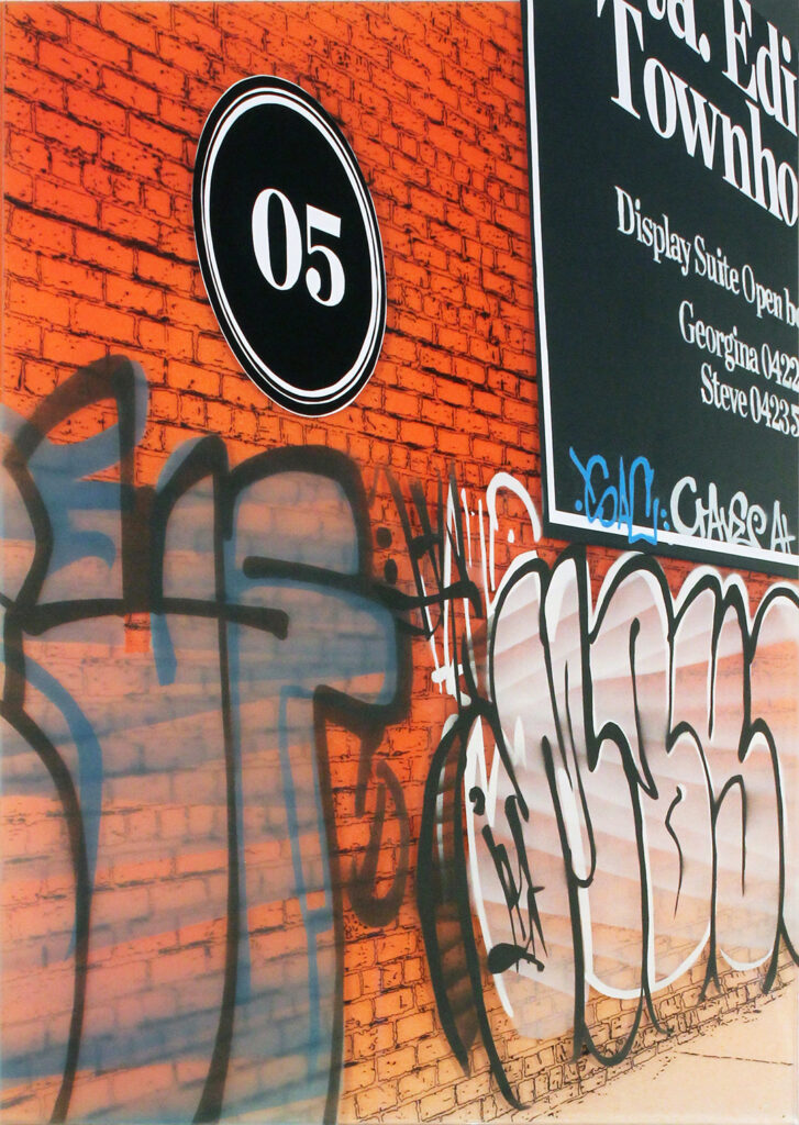 Artwork of Jacques brick wall in Richmond, Victoria showing signage and graffiti