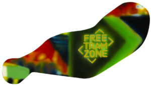 Extremely blurred image of a tram stop in Melbourne with a tram in the bottom left - text says FREE TRAM ZONE
